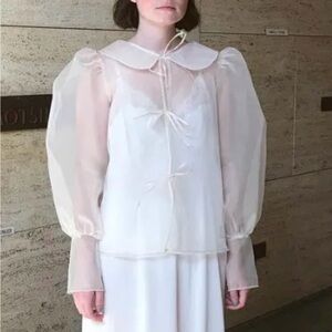 Elegant Cream Blouse with Sheer Sleeves